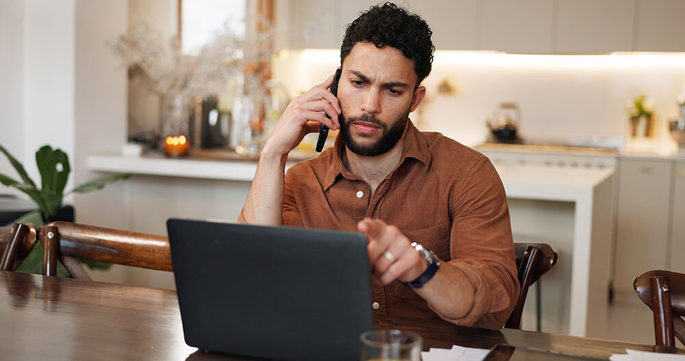 Utility customer looking for an appliance rebate on phone with customer service.